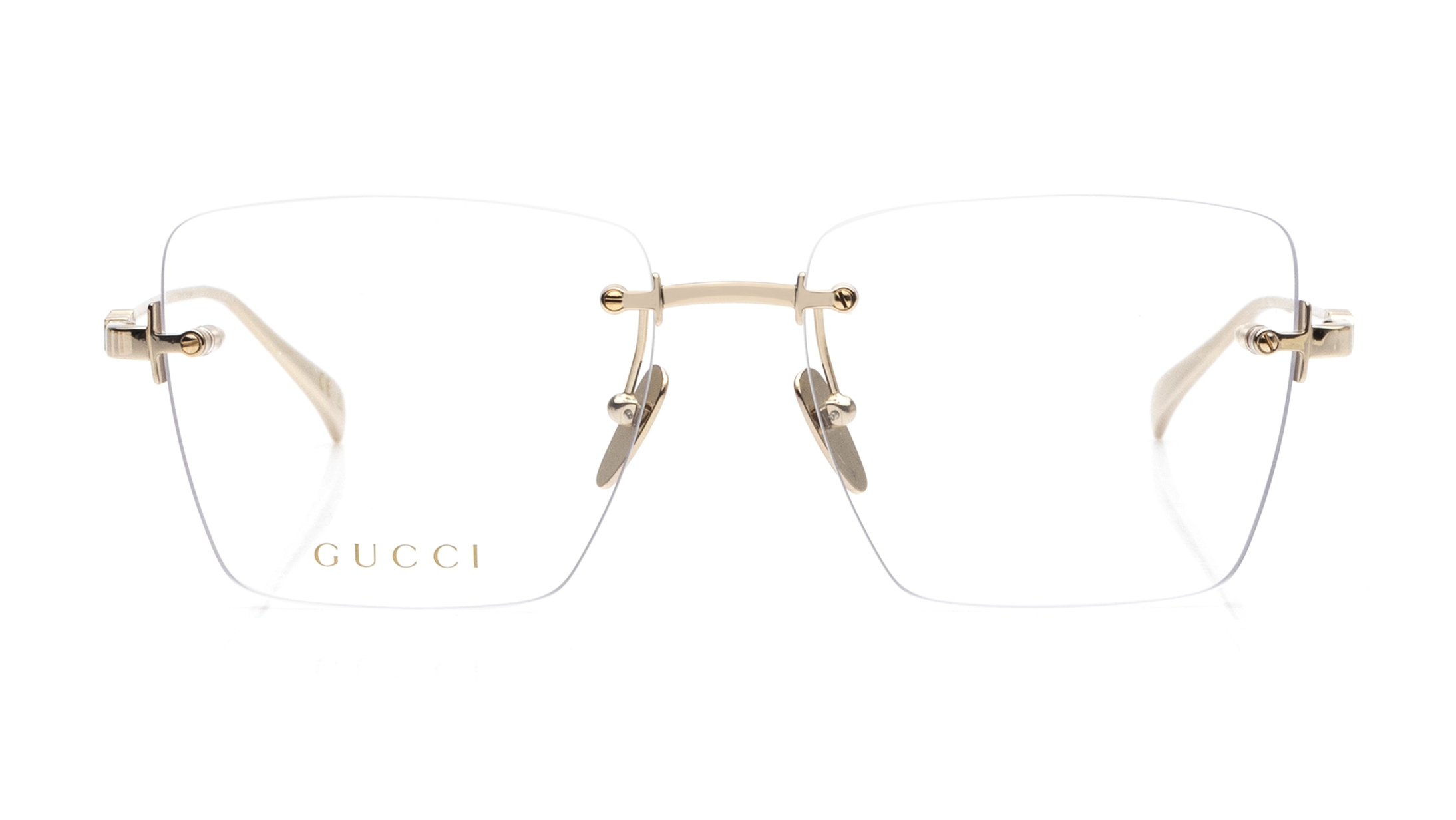 Image 1 of Gold Rectangle Eyeglasses for Women from Gucci Available at Titan Eye+