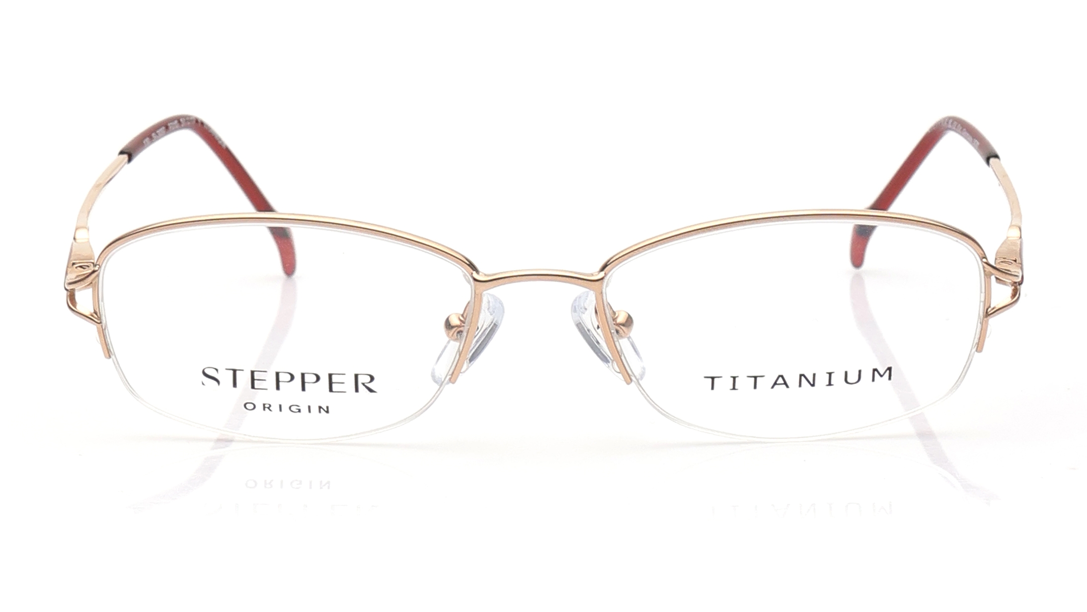 Image 1 of Gold Oval Eyeglasses for Women from Stepper Available at Titan Eye+