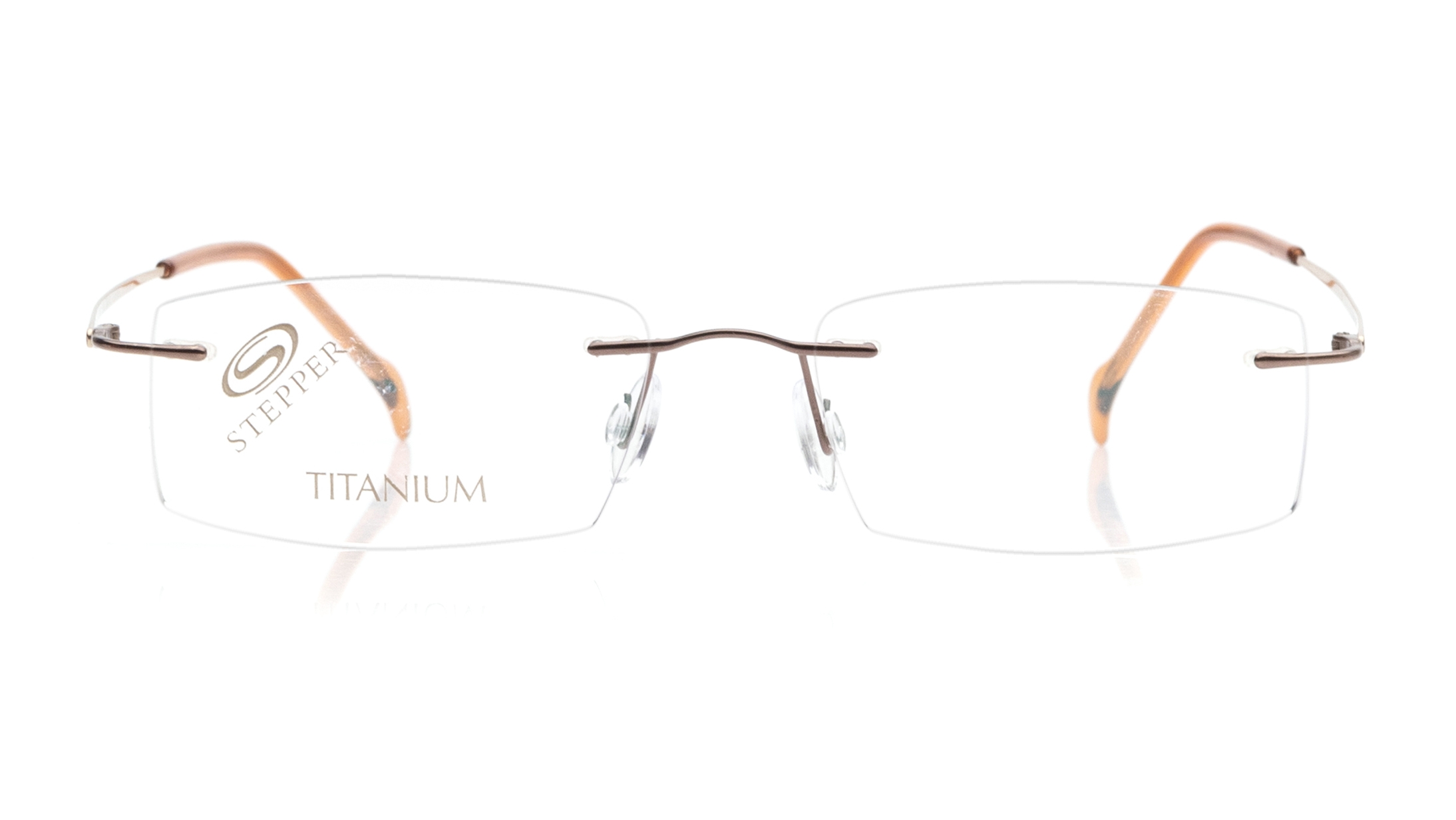 Image 1 of Brown Rectangle Eyeglasses for Women from Stepper Available at Titan Eye+