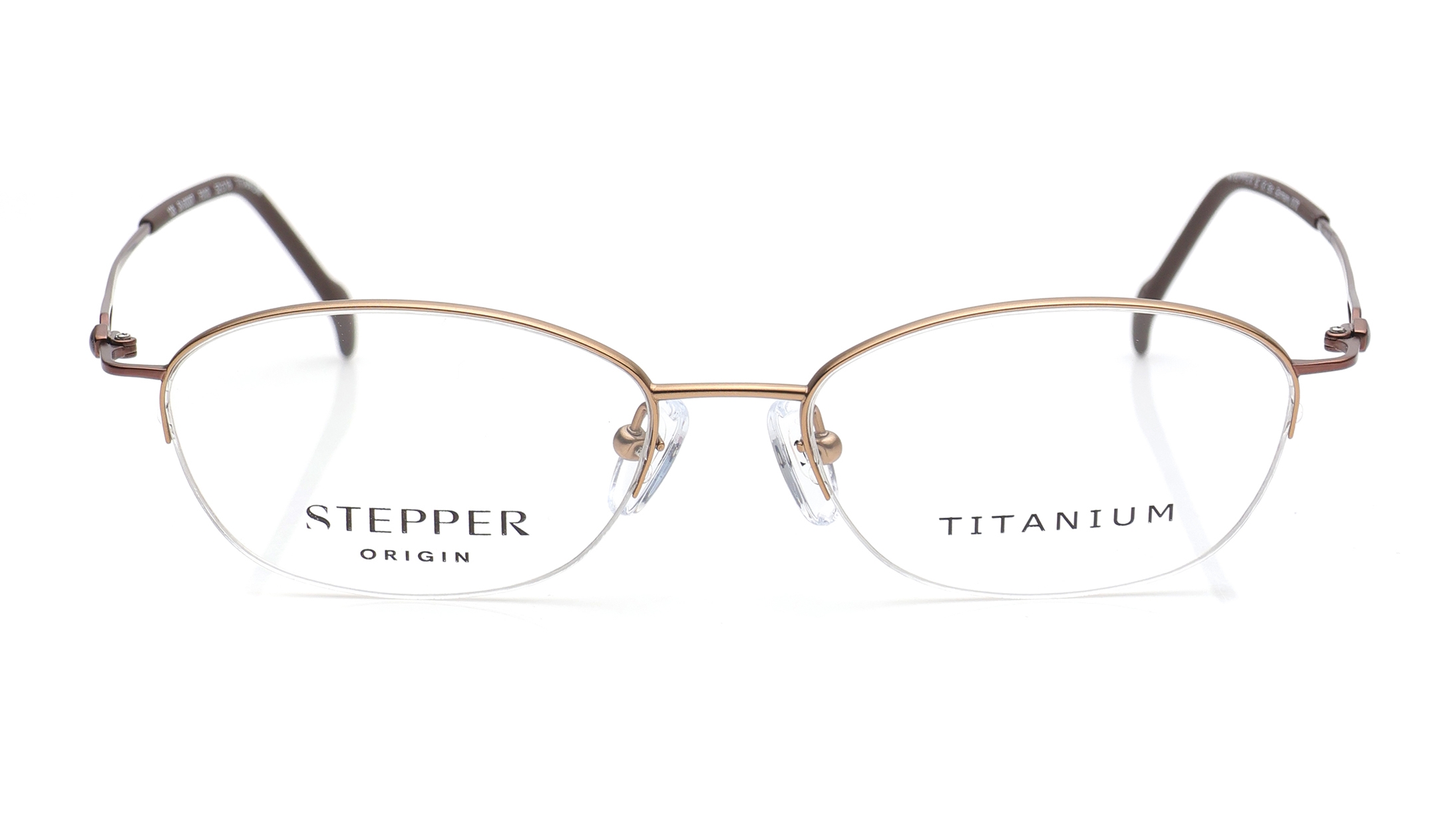 Image 1 of Gold Oval Eyeglasses for Women from Stepper Available at Titan Eye+