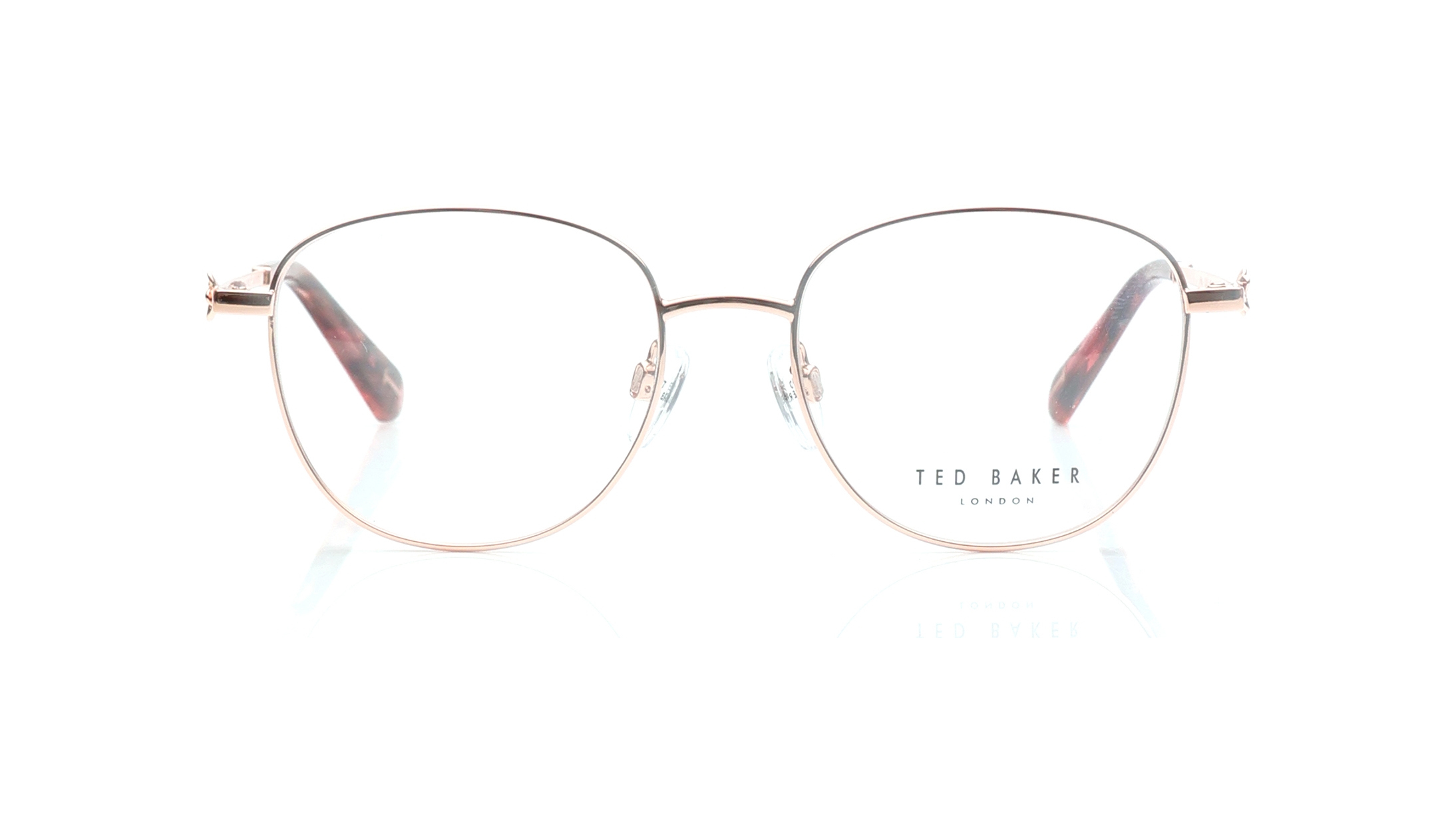 Image 1 of Rose Gold Oval Eyeglasses for Women from Ted Baker Available at Titan Eye+