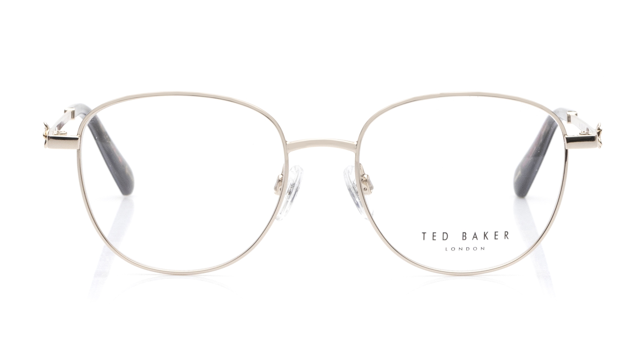 Image 1 of Gold Round Eyeglasses for Women from Ted Baker Available at Titan Eye+