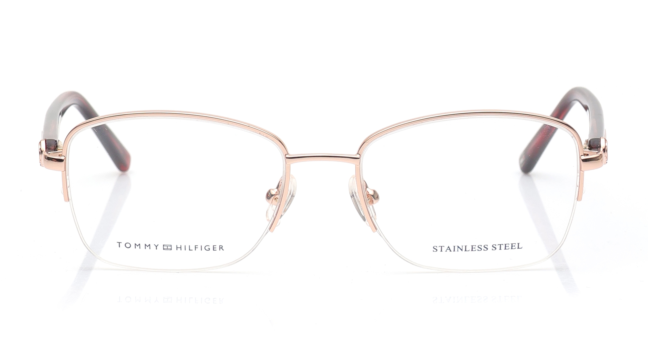 Image 1 of Rose Gold Oval Eyeglasses for Women from Tommy Hilfiger Available at Titan Eye+