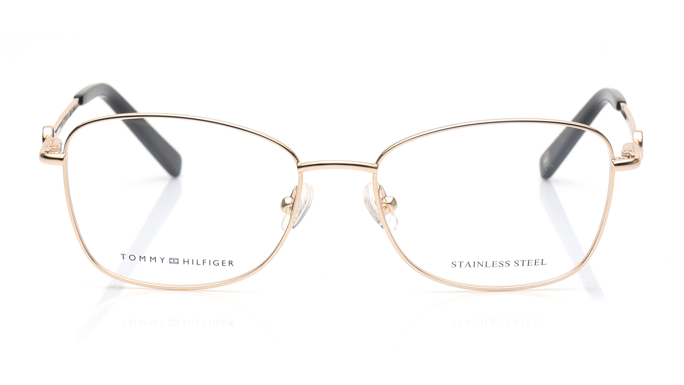 Image 1 of Gold Oval Eyeglasses for Women from Tommy Hilfiger Available at Titan Eye+