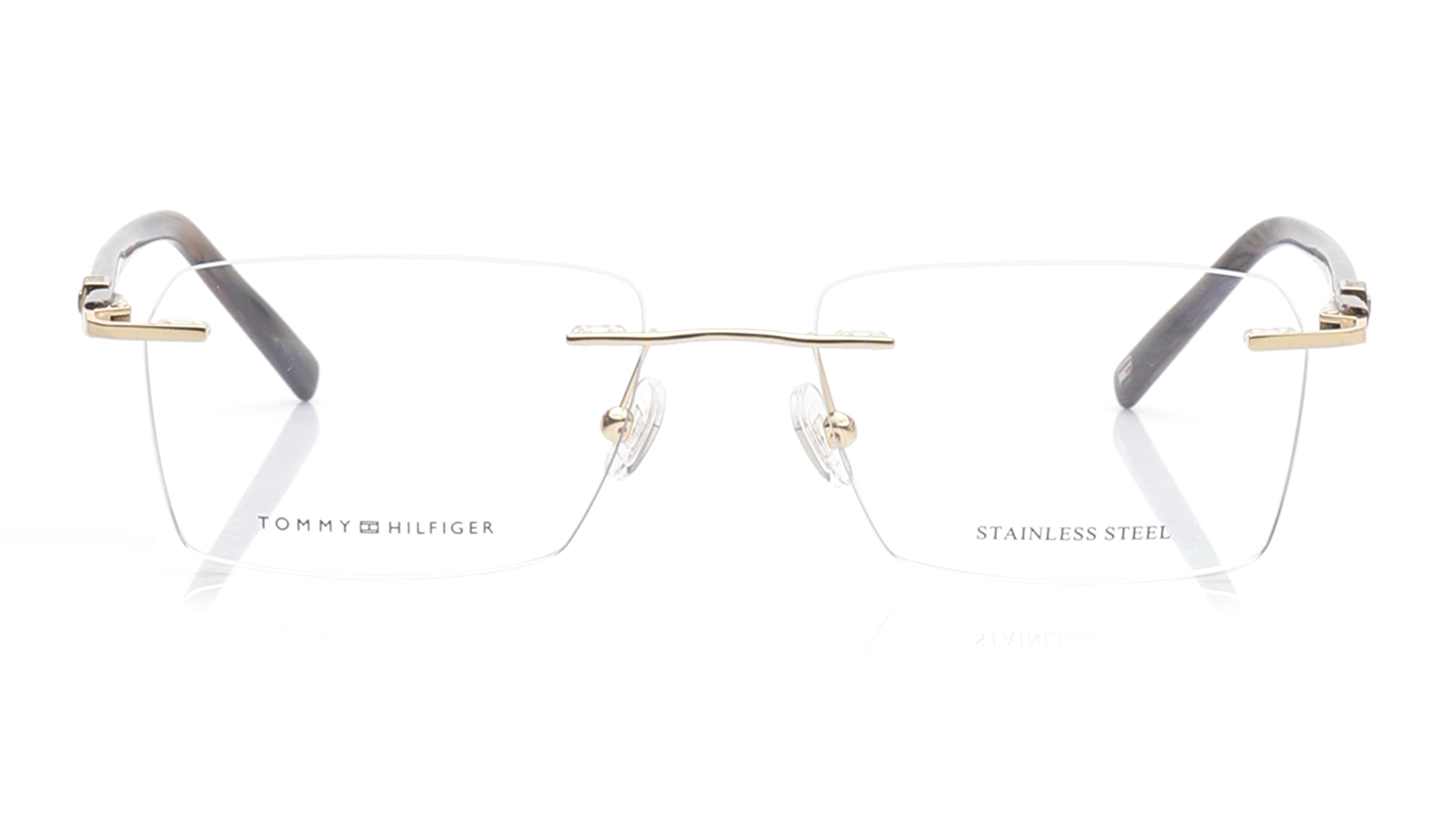 Image 1 of Brown Rectangle Eyeglasses for Men from Tommy Hilfiger Available at Titan Eye+