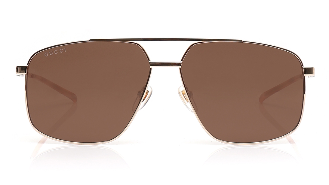 Image 1 of Brown Navigator Sunglasses for Men from Gucci Available at Titan Eye+