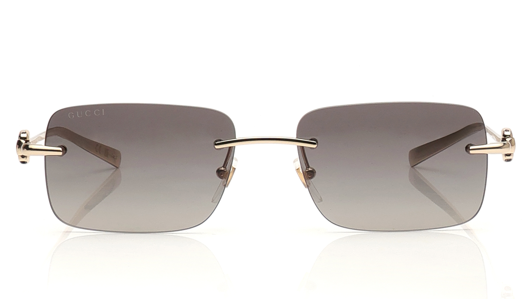 Image 1 of Grey Rectangle Sunglasses for Men from Gucci Available at Titan Eye+