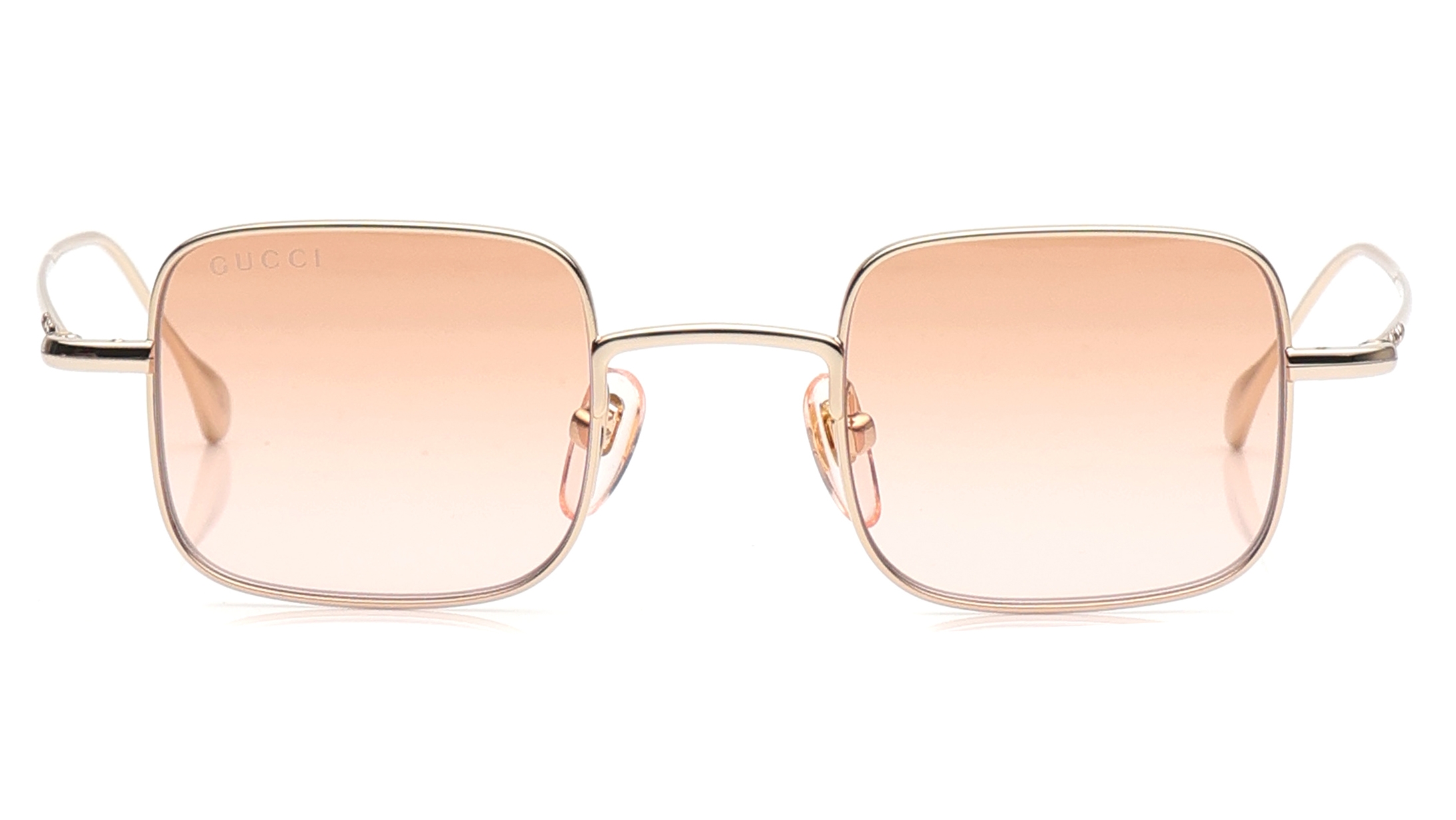 Image 1 of Orange Rectangle Sunglasses for Men and Women from Gucci Available at Titan Eye+