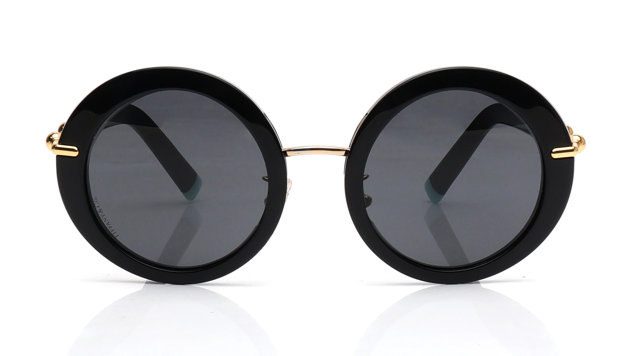 Image 1 of Gold Round Sunglasses for Men And Women from Tiffany & Co. Available at Titan Eye+