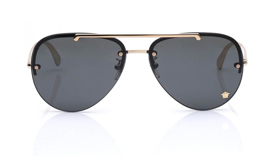 Image 1 of Gold Aviator Sunglasses for Women from Versace Available at Titan Eye+