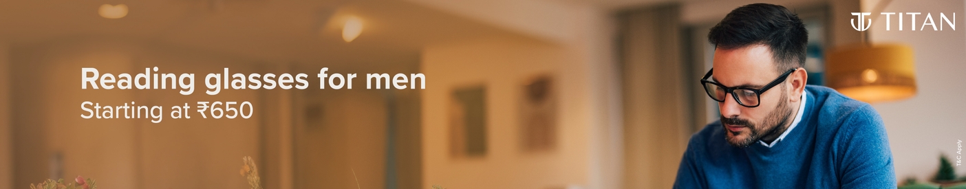 A man wearing Titan reading glasses, starting at ₹650.